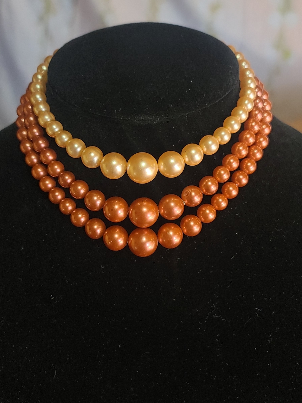 Classic Multi-Strand Pearl Necklace in Gold and Copper Tones